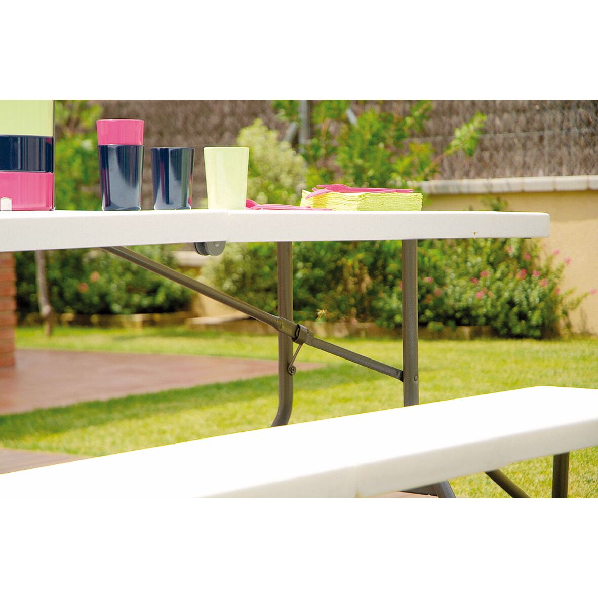 Garbar slim rectangular folding table indoors, outdoors