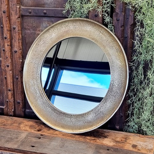large brass antique round mirror
